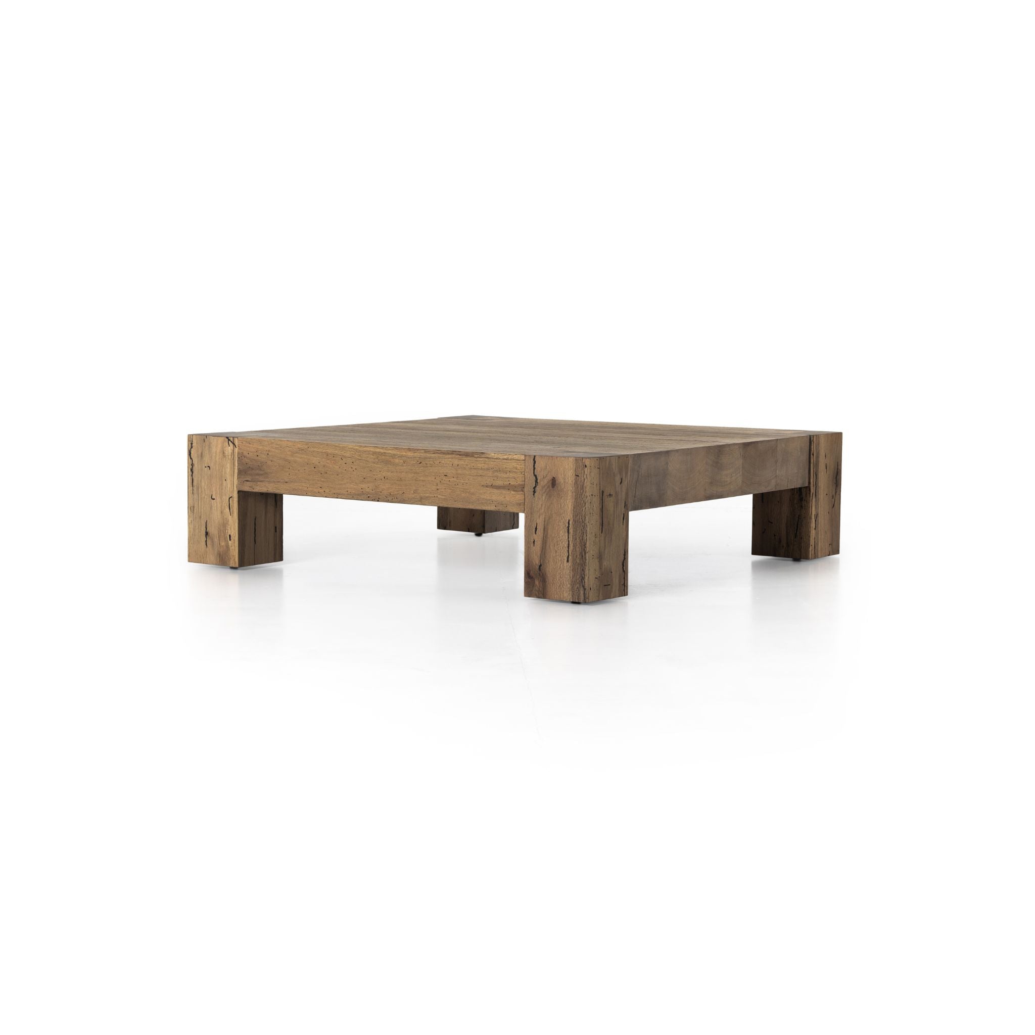 Simply Elevated - Elevate your living space with our Abaso Coffee Table. A captivating piece constructed from thick oak veneer, and chunky squared legs beautifully mimics the charm of wormwood, adding character and warmth to any room. 