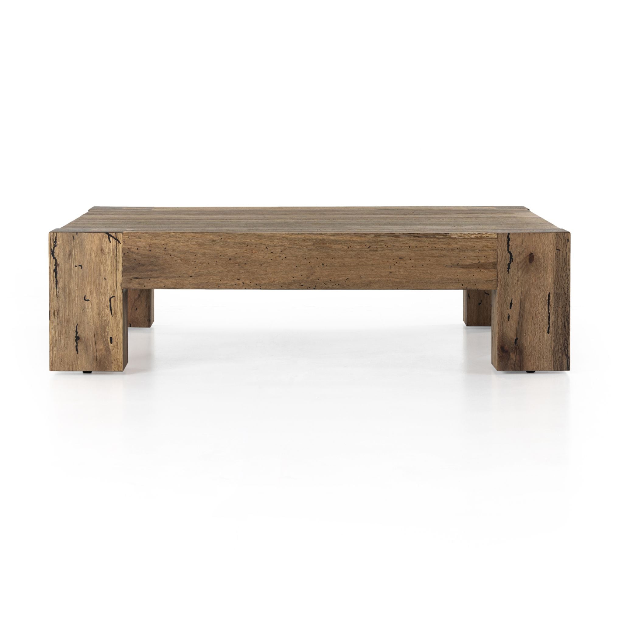 Simply Elevated - Elevate your living space with our Abaso Coffee Table. A captivating piece constructed from thick oak veneer, and chunky squared legs beautifully mimics the charm of wormwood, adding character and warmth to any room. 