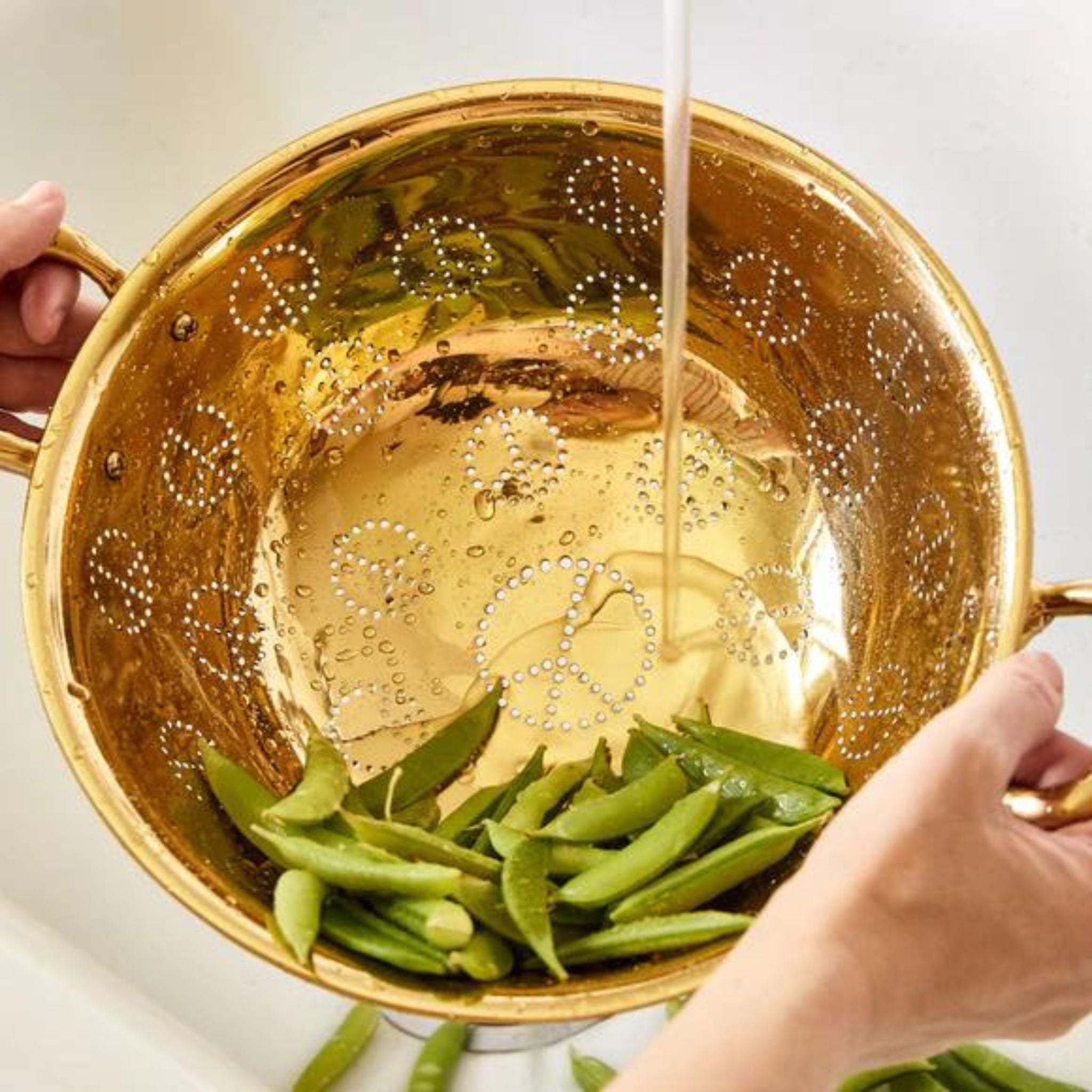 Simply Elevated - The Brass Peace Colander may be the most adorable sieve we've ever seen. Made from shiny solid brass and featuring little peace signs comprised of holes for liquids to seep through, the colander is sure to delight cooks and guests alike.